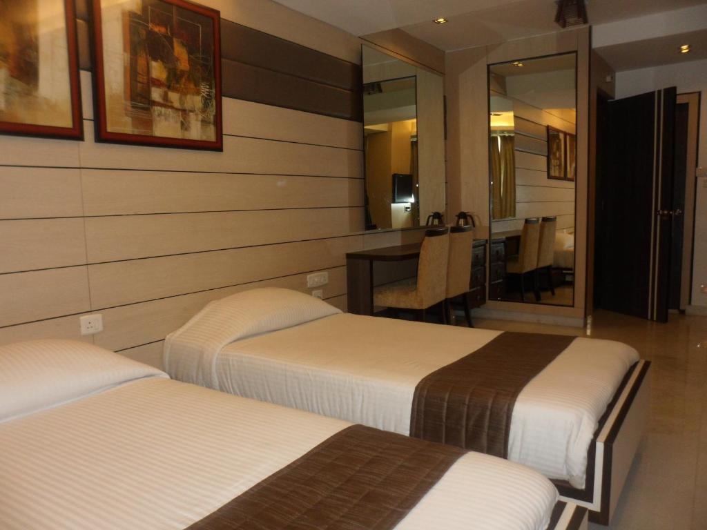 Hotel Esteem Calcutá Quarto foto